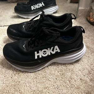 Black and white hokas